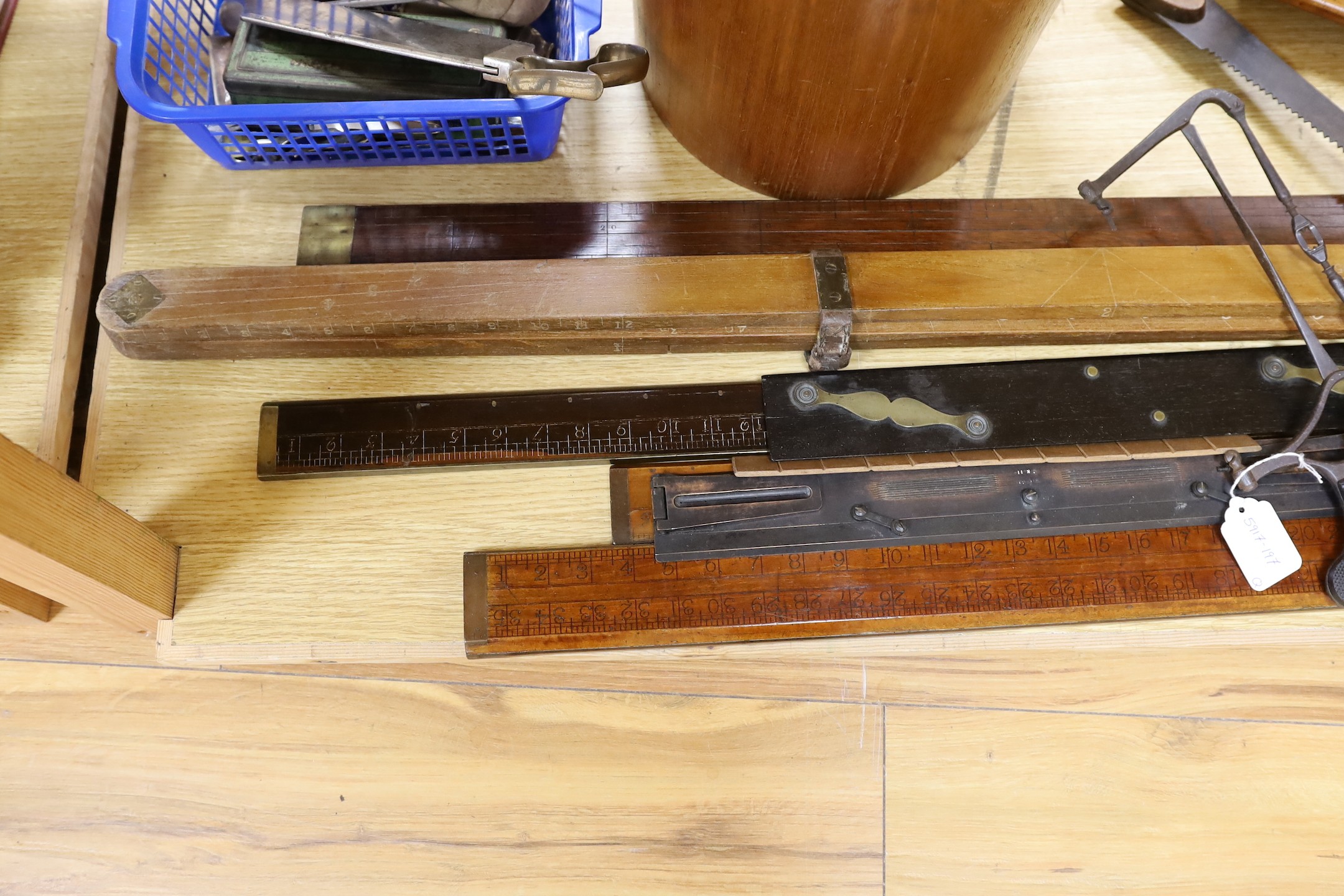 A leather writing box, a collection of wooden rulers, a small collection of wood working and surgeon’s tools etc